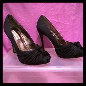 Steve Madden Black platform peep toe shoes.